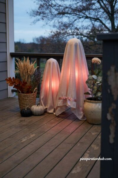 Pink stripe ghost Halloween decor with soft glowing light