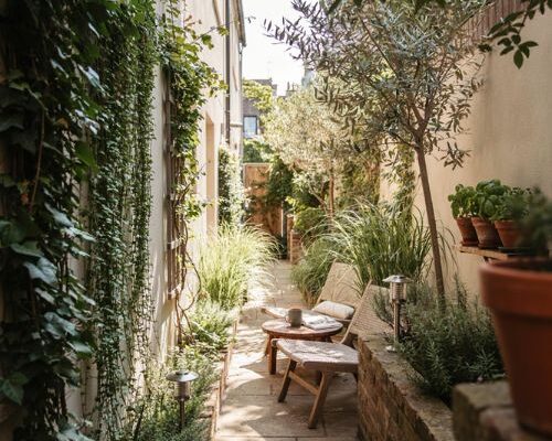 Small backyard ideas to make a compact space feel bigger