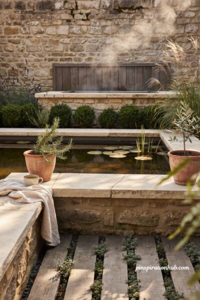 Small backyard seating ideas with raised pond