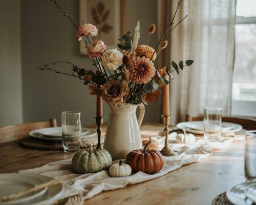 Thanksgiving flower arrangements with a warm gathered harvest look