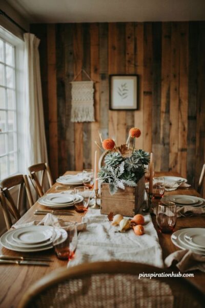 Thanksgiving flower arrangements with succulents and orange mums