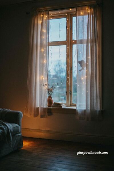 Twinkling fairy light curtain for a magical Halloween window display