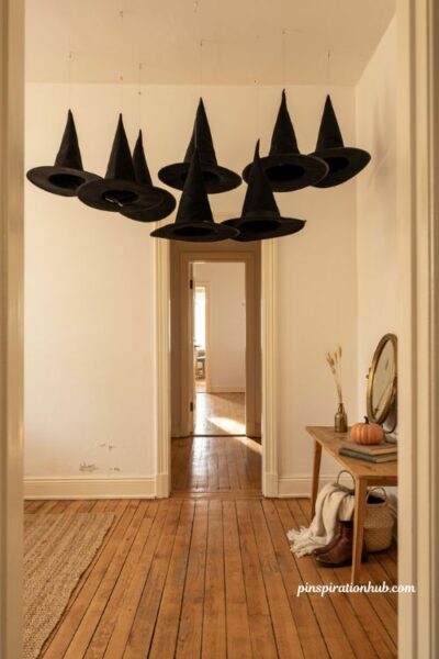 Witches hats Halloween apartment decor hanging from ceiling