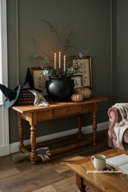Witchy Halloween decor with cauldron witch hats and dark academia style
