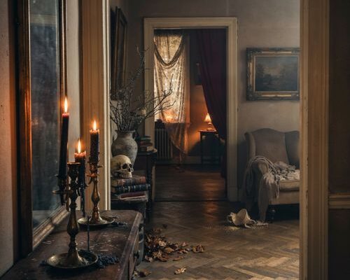 creepy halloween decorations in an old haunted vintage home with dim candlelight
