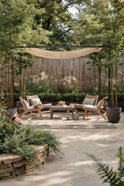dream backyard with layered plants and natural privacy around a cozy seating area